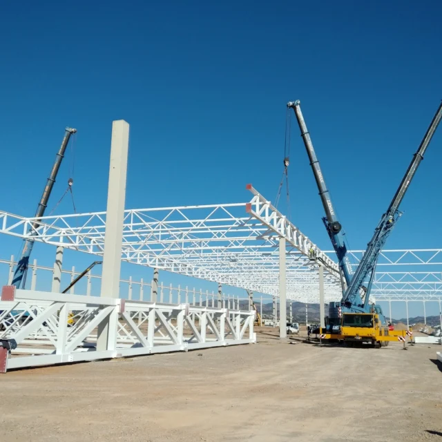 structuras Metálicas

En Acople 2010, somos expertos en la fabricación de estructuras metálicas para una amplia variedad de proyectos de construcción. Desarrollamos soluciones específicas para edificios industriales, naves ganaderas, pabellones agrícolas, cebaderos, viviendas, silos y pabellones polideportivos. Además, construimos aparcamientos metálicos, cubiertas para plazas de toros, pasarelas metálicas y cualquier otra estructura metálica que requiera.

Nuestro servicio integral incluye transporte y montaje con medios propios, lo que garantiza una entrega puntual y segura en cada proyecto. Con un equipo capacitado y tecnología avanzada, en Acople 2010 estamos comprometidos con la calidad, la precisión y la satisfacción de nuestros clientes.
#construcción#construcciónmetaliaca#arquitectura #ingenieria #obracivil #ceramica